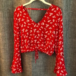 Red floral trumpet sleeve cropped top